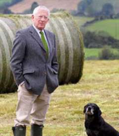 Nick Hewer with a dog