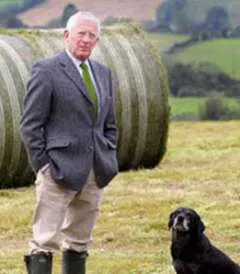 Nick Hewer with a dog
